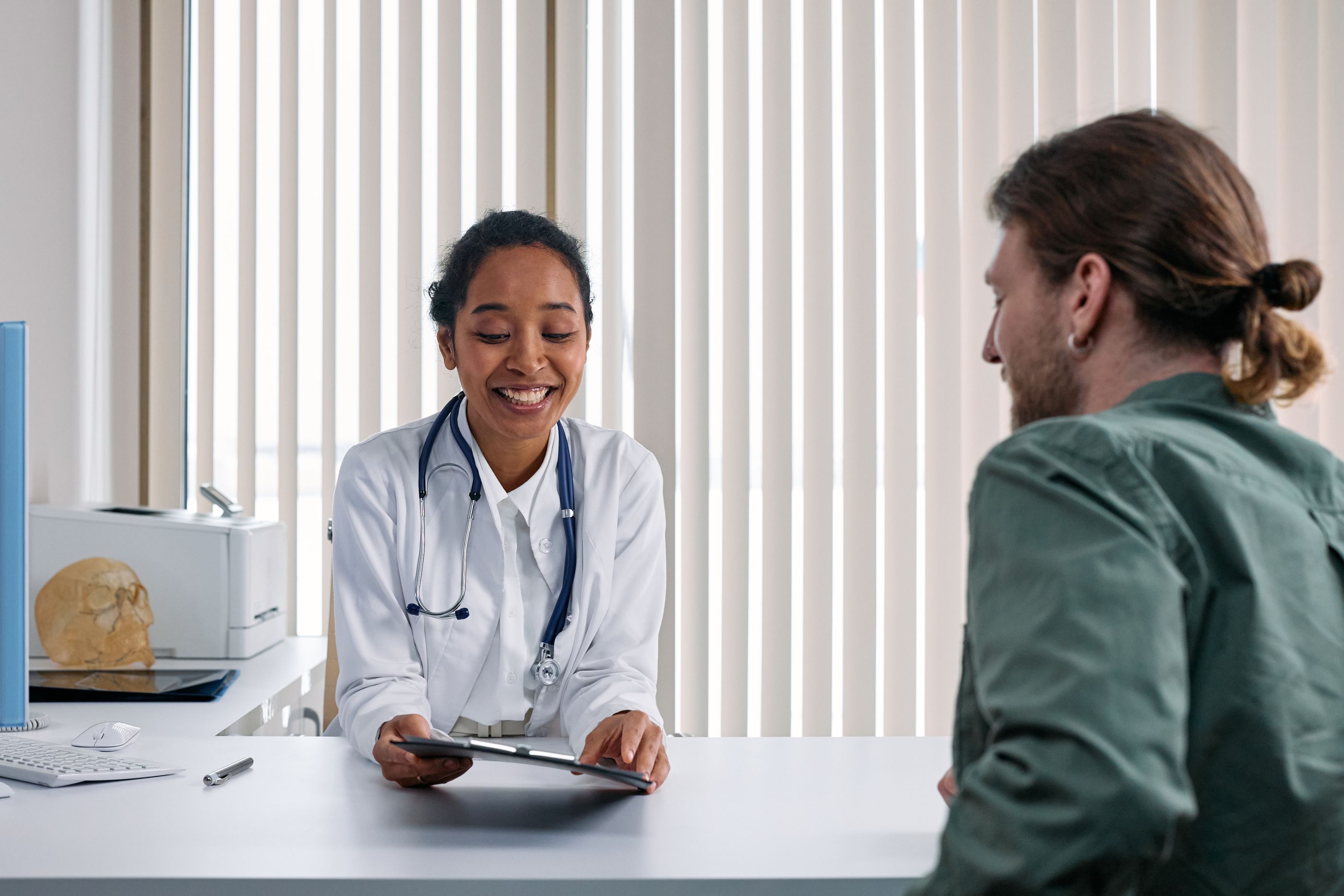 Doctor consulting with patient