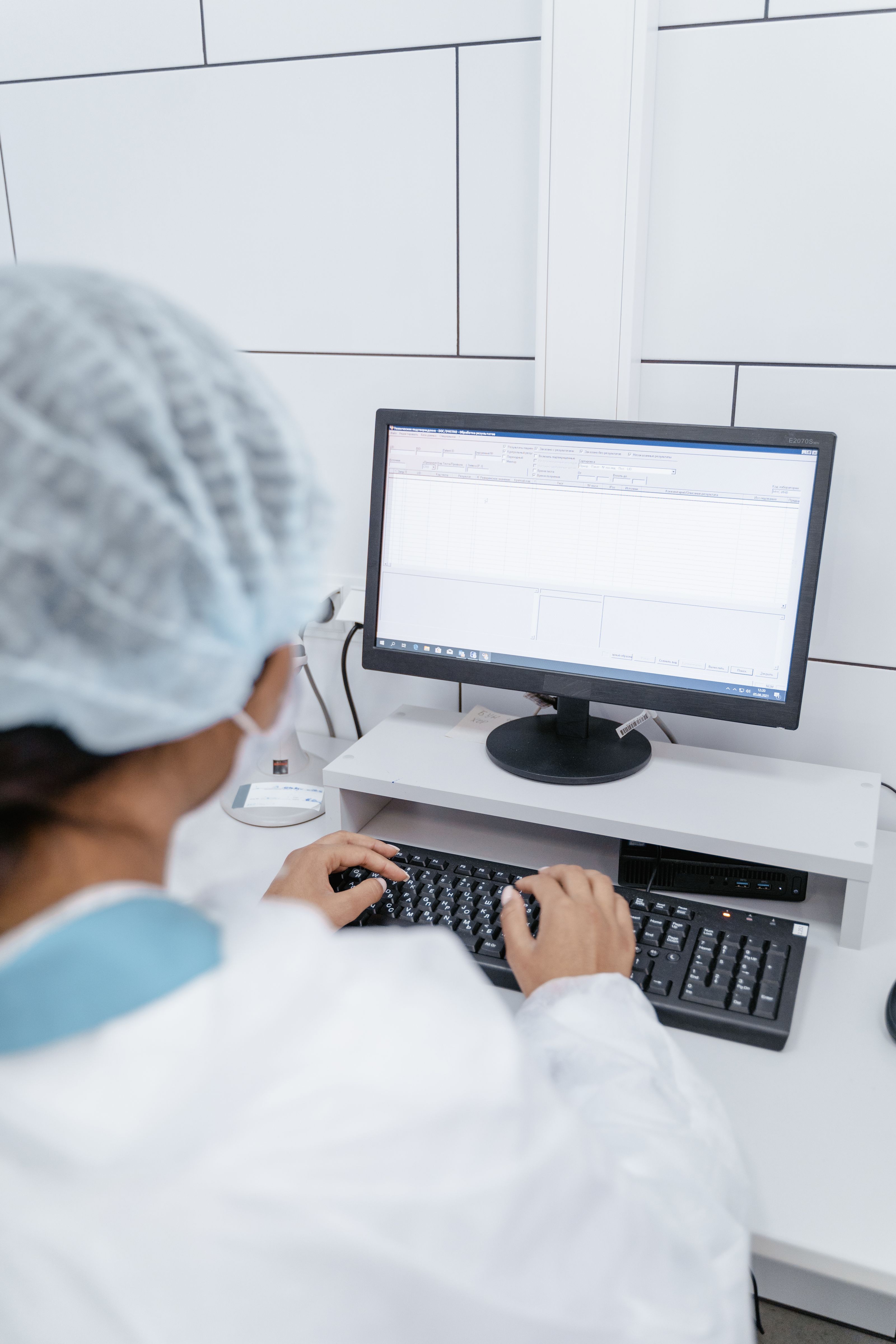 Clinician reviewing laboratory data on the LIS
